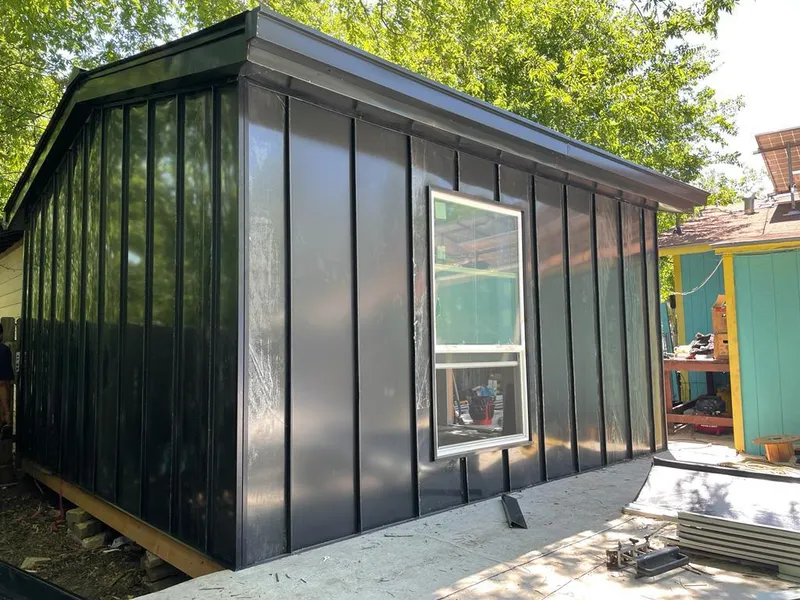 Black standing seam metal wall panels for Metal Roof Installation in Sunset Hills