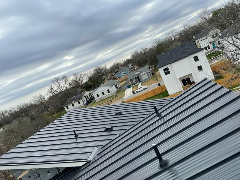 Standing seam metal roof panels with vents for Skylight Repair in Sunset Hills